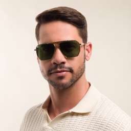 Shop BOTTEGA VENETA Aviator Sunglasses in Gold online.