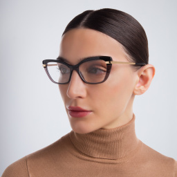 Shop Dolce & Gabbana Cat Eye Eyeglasses in Black On Transparent Black online.