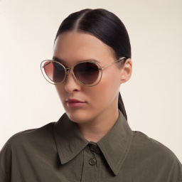 Shop MIU MIU Cat Eye Sunglasses in Pale Gold online.