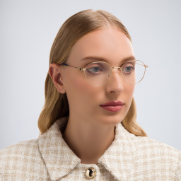 Shop GUCCI Round Eyeglasses in Gold online.