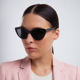 Shop MIU MIU Cat Eye Sunglasses in Black online.
