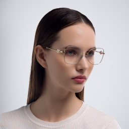 Shop BVLGARI Cat Eye Eyeglasses in Pale Gold online.