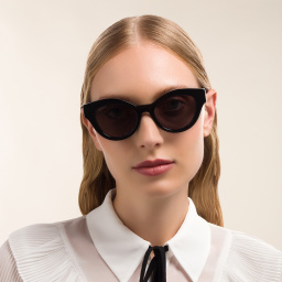 Shop GUCCI Cat Eye Sunglasses in Black online.