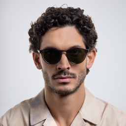 Shop GUCCI Round Sunglasses in Brown online.