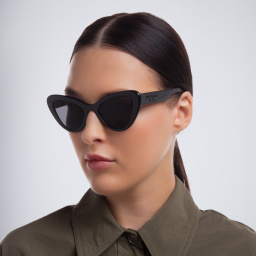 Shop PRADA Cat Eye Sunglasses in Black online.