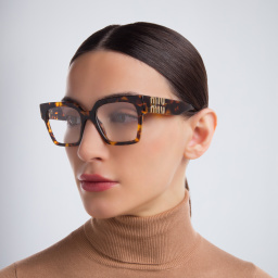 Shop MIU MIU Cat Eye Eyeglasses in Light Havana online.