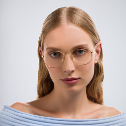 Shop Ray-Ban Hexagonal Unisex Eyeglasses in Polished Gold online.