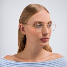 Shop Ray-Ban Hexagonal Unisex Eyeglasses in Polished Gold online.