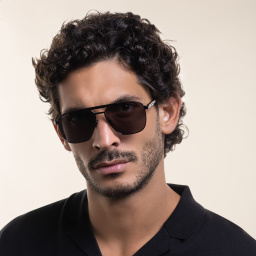 Shop GUCCI Aviator Sunglasses in Grey online.