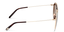 Shop TOM FORD Pilot Sunglasses in Shiny Pale Gold online.