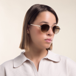 Shop SAINT LAURENT Unisex Round Sunglasses in Gold online.