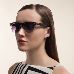 Shop Ray-Ban Unisex Round Sunglasses in Black On Transparent online.