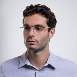 Shop Cartier Santos de Cartier Wide Rectangle Eyeglasses in Silver online.