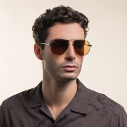 Shop GUCCI Aviator Sunglasses in Gold online.