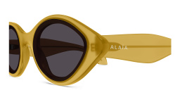 Shop ALAIA Logo Round Sunglasses in Yellow online.