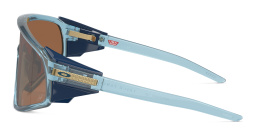 Shop Oakley Latch Panel Unisex Mask Sunglasses in Transparent Blue online.