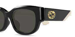 Shop GUCCI GG Oval Sunglasses in Black online.