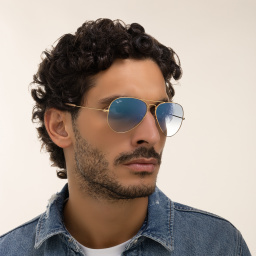Shop Ray-Ban Unisex Pilot Sunglasses in Metal in Gold online.
