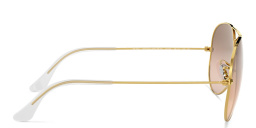 Shop Ray-Ban Unisex Aviator Sunglasses in Metal in Polished Arista Gold online.