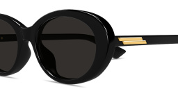 Shop BOTTEGA VENETA Classic Oval Sunglasses in Black online.