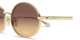 Shop Chloe Aly Petit Oval Sunglasses in Gold online.