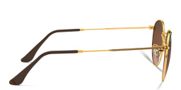 Shop Ray-Ban Unisex Round Metal Sunglasses in Gold online.