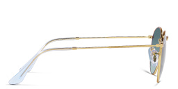 Shop Ray-Ban Round Metal Sunglasses in Gold online.