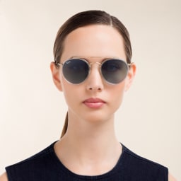 Shop Ray-Ban Round Double Bridge Sunglasses in Gold online.