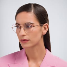 Shop Ray-Ban David Unisex Panthos Eyeglasses in Copper online.