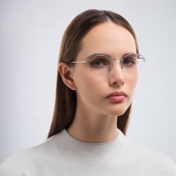 Shop Ray-Ban Round Gaze Unisex Half Rim Eyeglasses in Silver online.