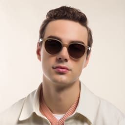 Shop Ray-Ban Unisex Round Sunglasses in Beige online.