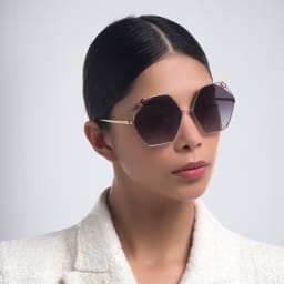 Shop BVLGARI Irregular Sunglasses in Pink Gold online.