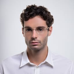 Shop Silhouette Rimless Wide Rectangle Eyeglasses in Gold online.