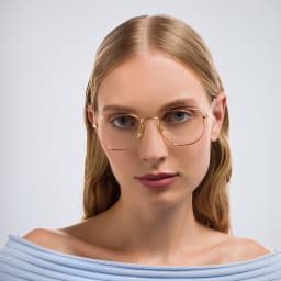 Shop Ray-Ban Hexagonal Unisex Eyeglasses in Polished Gold online.