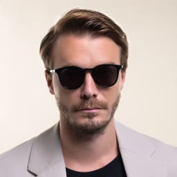 Shop GUCCI Round Sunglasses in Black online.