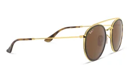 Shop Ray-Ban Unisex Round Sunglasses in Gold online.