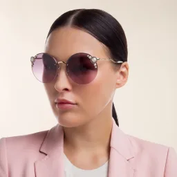 Shop MIU MIU Rimless Round Sunglasses in Pale Gold online.