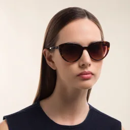 Shop PRADA Cat Eye Sunglasses in Havana online.