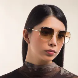 Shop Ray-Ban Square Sunglasses in Gold online.