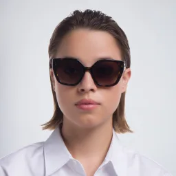 Shop PRADA Cat Eye Sunglasses in Havana online.