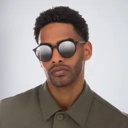 Shop Ray-Ban Unisex Round Sunglasses in Black online.
