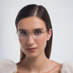 Shop EYE'M Rimless Wide Cat Eye Eyeglasses in Antique Gold online.