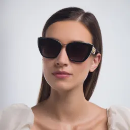 Shop Dolce & Gabbana Cat Eye Sunglasses in Black online.