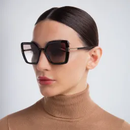 Shop PRADA Cat Eye Sunglasses in Black online.