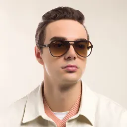 Shop Ray-Ban Unisex Aviator Sunglasses in Brown online.