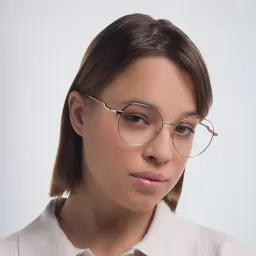 Shop Dolce & Gabbana Round Eyeglasses in Gold online.