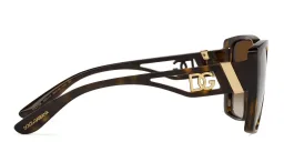 Shop Dolce & Gabbana Cat Eye Sunglasses in Brown online.