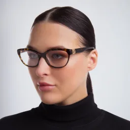 Shop Dolce & Gabbana Wide Cat Eye Eyeglasses in Havana online.