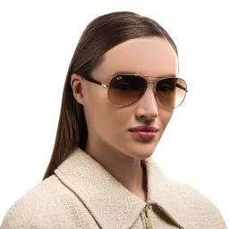 Shop Ray-Ban Unisex Pilot Sunglasses in Gold online.