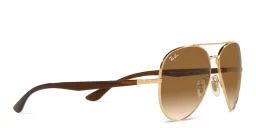 Shop Ray-Ban Unisex Pilot Sunglasses in Gold online.